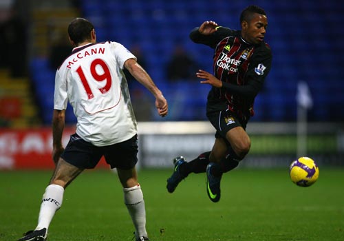 里程碑，国安后卫何宇鹏已在中超出战100场